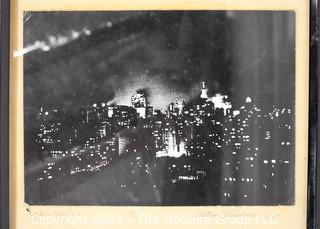 Framed Under Glass Black & White Photograph of New York City Entitled "While a Baby Cries" Signed and Numbered by Artist William Lawrence, 1969. Measures 12" x 15".