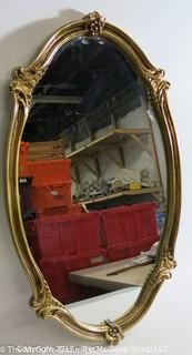 Oval wall mirror; 22 x 36" 