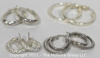 Four Pairs of Sterling Silver Pierced Hoop Earrings. 