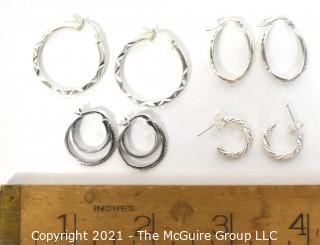 Four Pairs of Sterling Silver Pierced Hoop Earrings. 