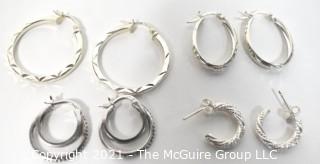 Four Pairs of Sterling Silver Pierced Hoop Earrings. 