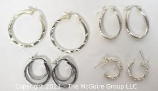 Four Pairs of Sterling Silver Pierced Hoop Earrings. 