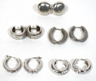 Set of Five Sterling Silver Pierced Earrings Including Hoops and Studs. 