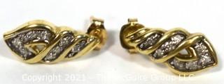 10 kt Gold with Clear Stone Earrings. Weighs 2.3 g.