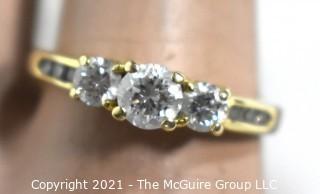 Yellow 14 Kt Gold Three Stone Diamond Engagement Ring.