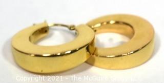 Pair of 14 kt Gold Thick Hollow Hoop Earrings. Weighs 2.6 g