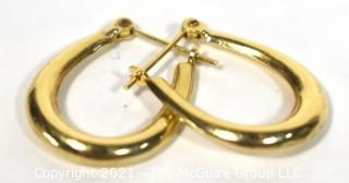 Pair of 14 kt Gold Hoop Pierced Earrings. Weighs 1.6 g