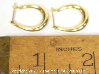 Pair of 14 kt Gold Hoop Pierced Earrings. Weighs 1.6 g