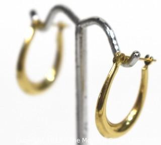 Pair of 14 kt Gold Hoop Pierced Earrings. Weighs 1.6 g