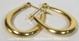 Pair of 14 kt Gold Hoop Pierced Earrings. Weighs 1.6 g