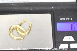 Pair of 14 kt Gold Hoop Pierced Earrings. Weighs 1.6 g