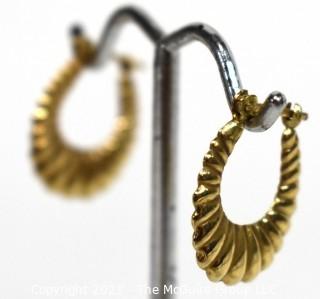 Pair of 14 kt Gold Hollow Scallop Hoop Pierced Earrings. Weighs 1.6 g