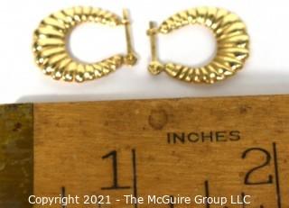 Pair of 14 kt Gold Hollow Scallop Hoop Pierced Earrings. Weighs 1.6 g