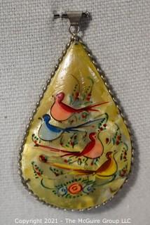 Vintage Asian Mother of Pearl Hand Painted Double Sided Pendant with Silver Mounting. Measures approximately 3" long.