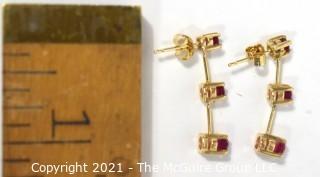 Set of 14kt Yellow Gold Ring and Dangle Earrings with Rubies.   Weighs 3.5 g