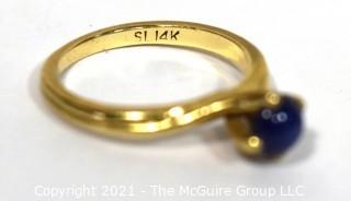 14kt Yellow Gold with Blue Star Sapphire Ring.  Weighs 2.4 g.