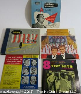 Collection of 12 vinyl record albums and 1 8" album