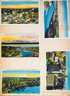 (19) Photo Postcards and (83) Vintage Commercial Postcards; mounted on scrapbook pages