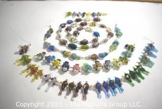 Srtands of Hand Blown Fused Glass Beads - Fish and Birds. 