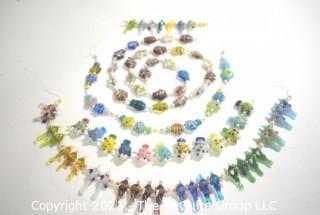 Srtands of Hand Blown Fused Glass Beads - Fish and Birds. 