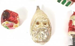 Group of Vintage Santa Clause Figural Hand Painted Mercury Glass Christmas Ornaments.