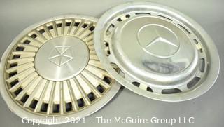 Two (2) Vintage Car Hubcaps for Chrysler and Mercedes.