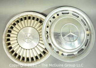 Two (2) Vintage Car Hubcaps for Chrysler and Mercedes.