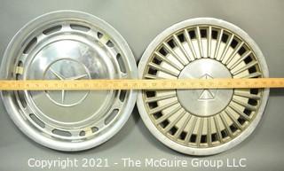 Two (2) Vintage Car Hubcaps for Chrysler and Mercedes.