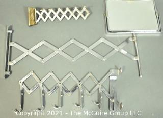 Three (3) Scissor Accordion Wall Mount Items Including Mirror, Clothing and Accessory Hooks. 