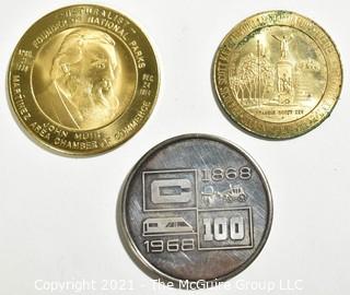 Three (3) Vintage Tokens Including John Muir, Naturalist, Founder of National Parks Medal, 1964-1965. The Maryland Worlds Fair Commission & Bart Bay Area Rapid Transit System Token.