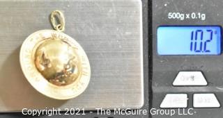 14k Yellow Gold "Around the World with You" Globe Pendant or Charm.  Weighs 10.2g 