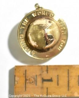 14k Yellow Gold "Around the World with You" Globe Pendant or Charm.  Weighs 10.2g 