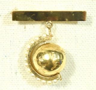 14kt Gold Articulated Globe with Pearl Stand on Gold Bar Brooch.  Weighs 12.3g