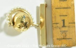 14kt Gold Articulated Globe with Pearl Stand on Gold Bar Brooch.  Weighs 12.3g