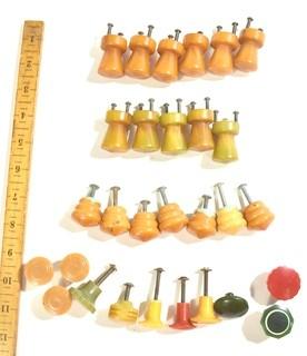 Group of Bakelite Knobs and Drawer Pulls in Red, Green, Yellow and Butterscotch