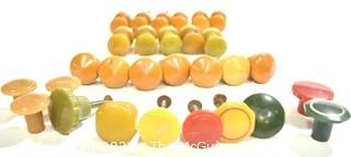 Group of Bakelite Knobs and Drawer Pulls in Red, Green, Yellow and Butterscotch