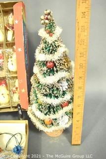 Group of Vintage Christmas Items Including Bottle Brush Tree, Tinsel Tree Topper and NIB Wax Tavern Candle Ornaments 