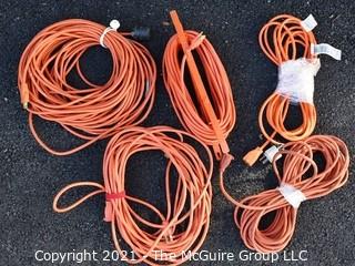 Five (5) Orange Outdoor Extension Cords. 