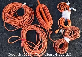 Five (5) Orange Outdoor Extension Cords. 