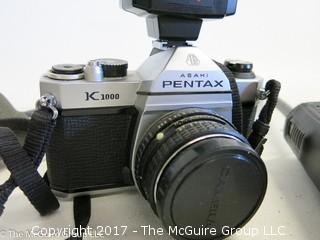 Collection including monocular; binoculars; Radio Shack walkie-talkie's; and Pentax K-1000 camera 