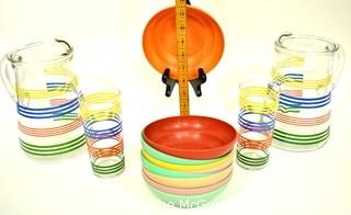 Set of Mid Century Bright Stripe Glassware Pitchers and Tumblers and  Bright Tupperware Bowls. 