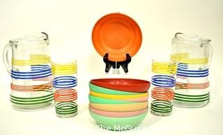 Set of Mid Century Bright Stripe Glassware Pitchers and Tumblers and  Bright Tupperware Bowls. 