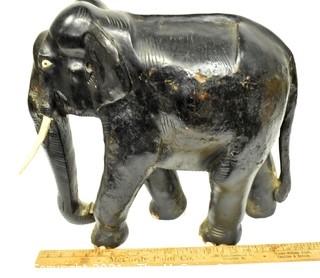 Large Asian Rosewood Carved Elephant Statue with Bone Tusks.  Measures 9" x 18" x 21". Consignor states it was an artifact in Senate Majority Leader Howard Baker's office.  