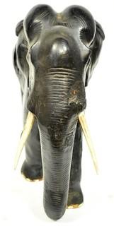 Large Asian Rosewood Carved Elephant Statue with Bone Tusks.  Measures 9" x 18" x 21". Consignor states it was an artifact in Senate Majority Leader Howard Baker's office.  