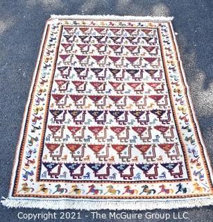 Vintage Wool Hand Woven Rug with Animal Figures on White Ground.  Measures 40" x 58".