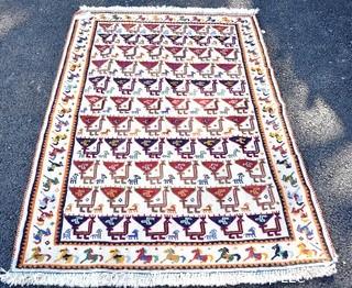 Vintage Wool Hand Woven Rug with Animal Figures on White Ground.  Measures 40" x 58".