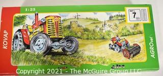 Vintage 1:25 Kovap Agro Tin Litho Set No. 7  Wind Up Tractor Toy With Equipment  NIB New in Box. {Note: Description Altered 10.14.2021 @ 6:46pm ET}