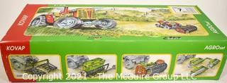 Vintage 1:25 Kovap Agro Tin Litho Set No. 7  Wind Up Tractor Toy With Equipment  NIB New in Box. {Note: Description Altered 10.14.2021 @ 6:46pm ET}