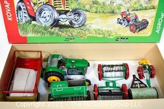 Vintage 1:25 Kovap Agro Tin Litho Set No. 7  Wind Up Tractor Toy With Equipment  NIB New in Box. {Note: Description Altered 10.14.2021 @ 6:46pm ET}