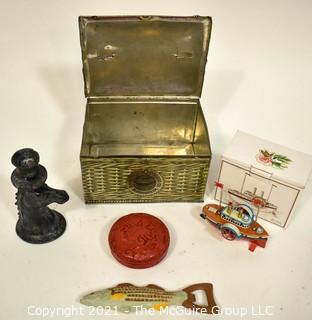 Patterson's Seal Cut Plug Tobacco Tin, Primitive Metal Horse Candlestick, Fish Bottle Opener, Cinnabar Box and Tin Litho Steamboat Ornament in Box. 
